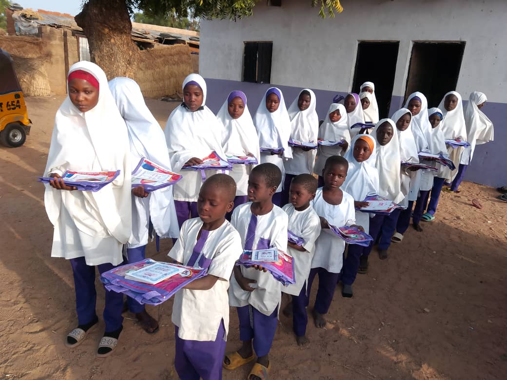 GMBN DONATES SCHOOL BAGS AND HOLY QUR’AN TO ISLAMIYYA STUDENTS IN JIGAWA